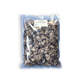Charcoal-colored cornflakes in clear bag with white label, ideal with dried black summer truffle
