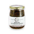 Jar of minced black truffle with chopped summer truffle in olive oil for gourmet dishes