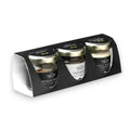 Black and silver truffle oil set in glass jars with gold lids from Trilogy Truffle Gift Box